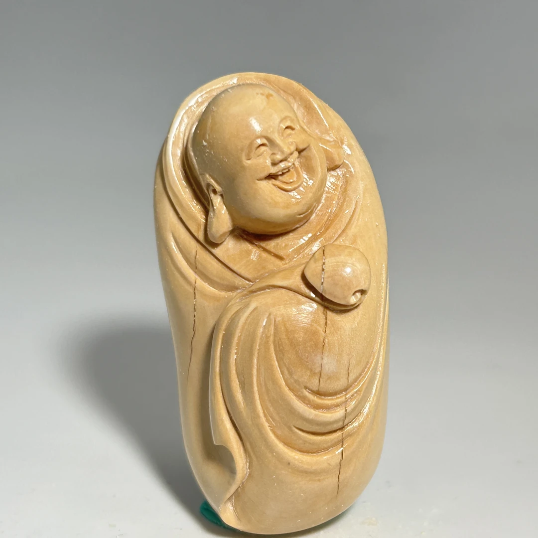 猛犸牙雕奶黄咖弥勒把件50*25*20mm假一罚四X1151