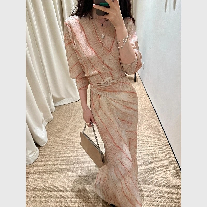 专柜潮流2025夏季新款法式气质时尚独特漂亮高级设计感杏色连衣裙