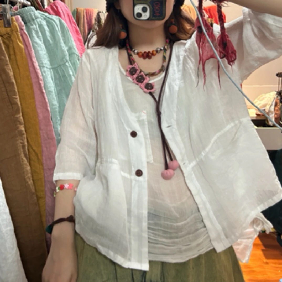 妞妞 新款苎麻v领纽扣单层口袋小衫