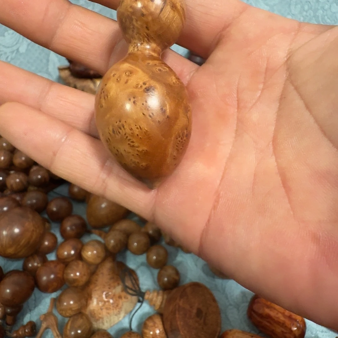 用***1木麻梨疙瘩蚂蚁肚葫芦手把件