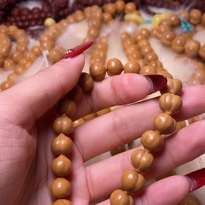 阳***บ猴头核桃手串一物11镜面柯基