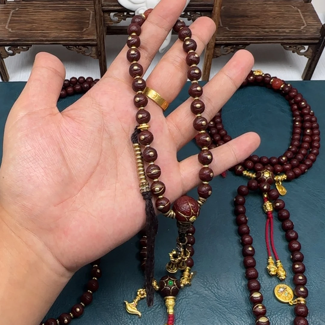 浪***啊凤眼菩提吊坠凤眼金钉手持8.8铜配