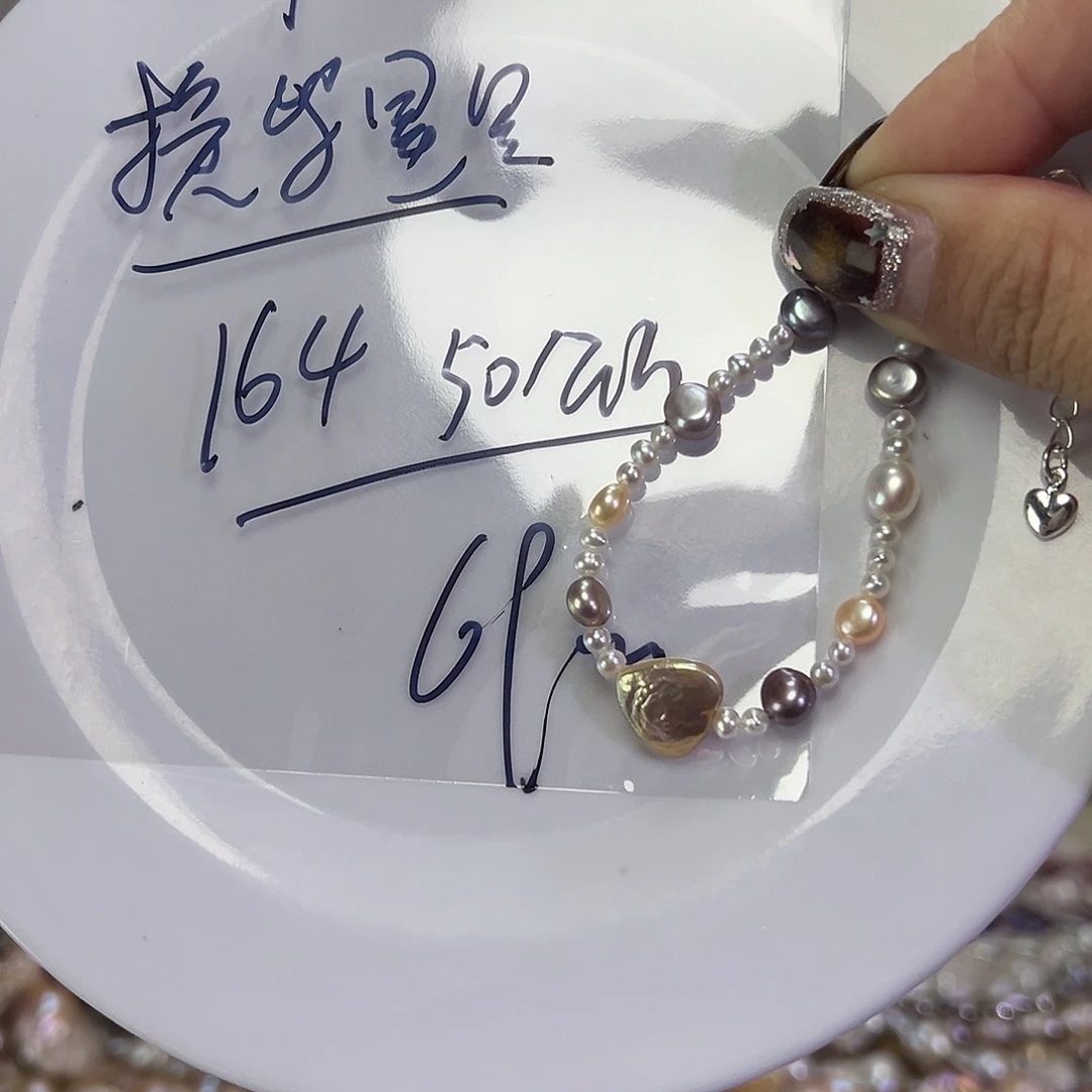 左***出淡水珍珠手链钛钢