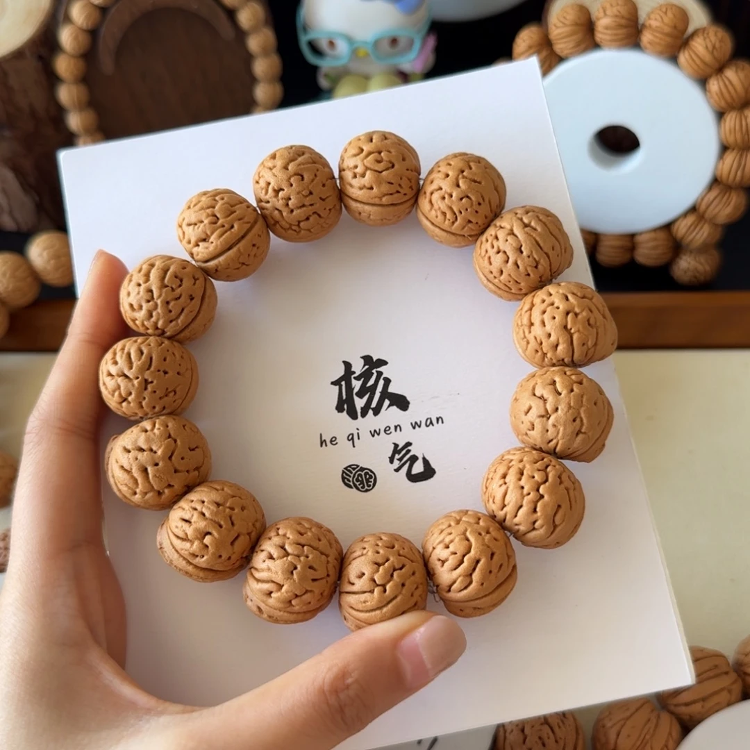 嗖***哈22➕肌肉茶壶桃核吊坠