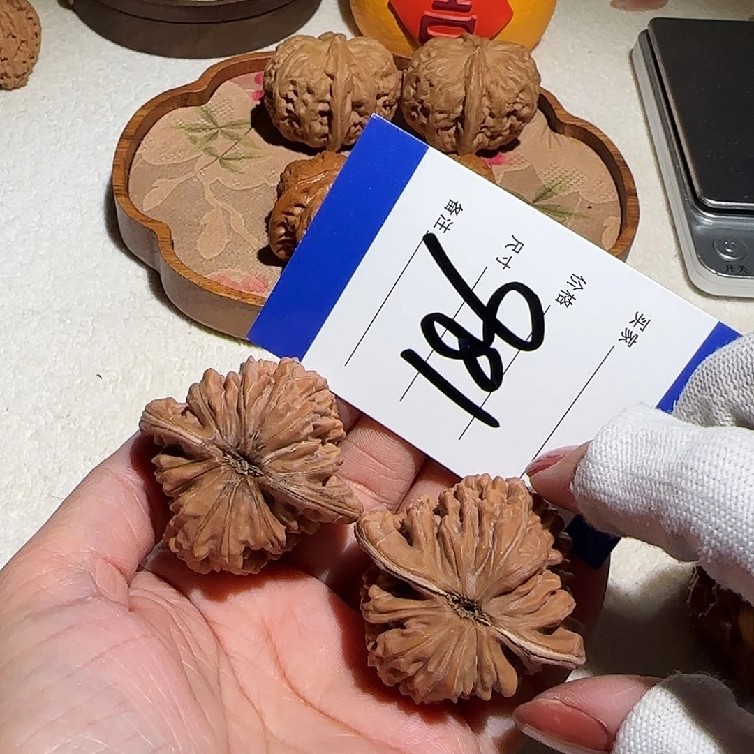 文玩核桃把件哎**。44楼186号