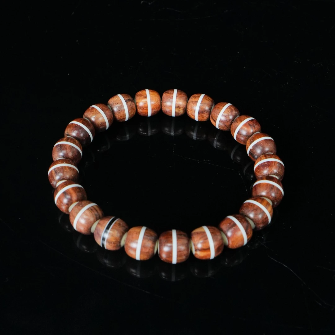 7608 越南黄花梨卯榫珠 1.0x0.95cm  12.54g