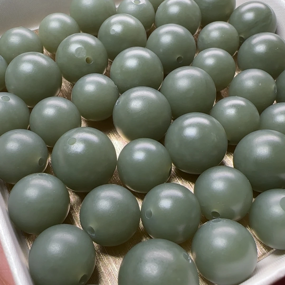 和田玉未镶嵌颈饰青玉籽单珠一对