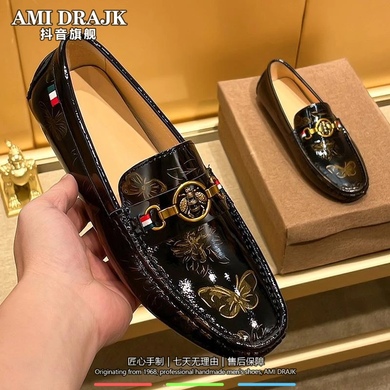 AMI DRAJK秋冬2025新款小蜜蜂黑色高端豆豆鞋男真皮亮皮懒人鞋