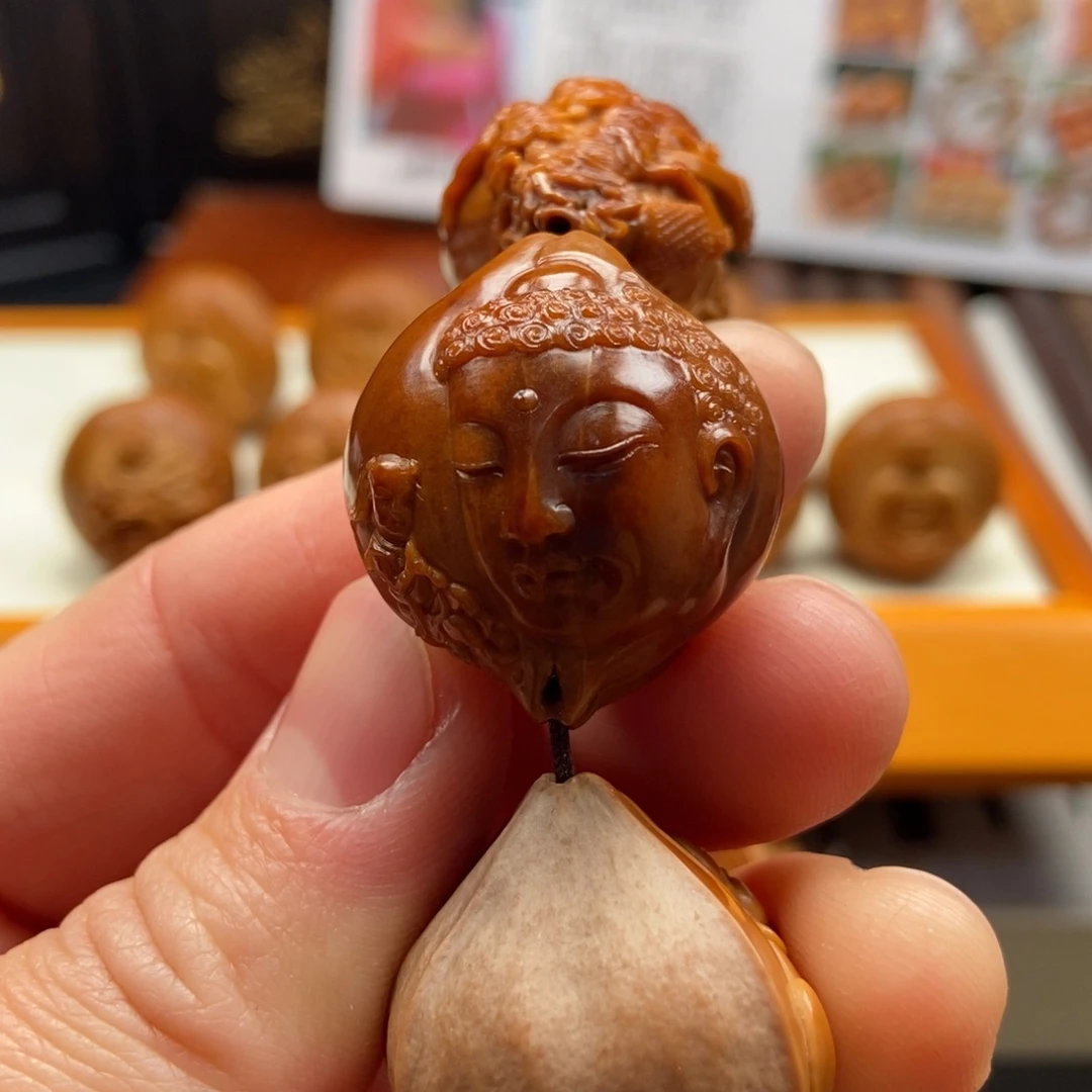 橄榄核把件S****d纯手工核雕