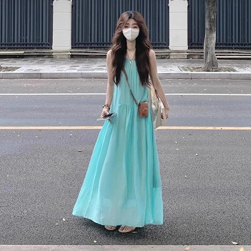 法式超仙挂脖连衣裙夏慵懒风海边度假小众设计吊带无袖长裙0570