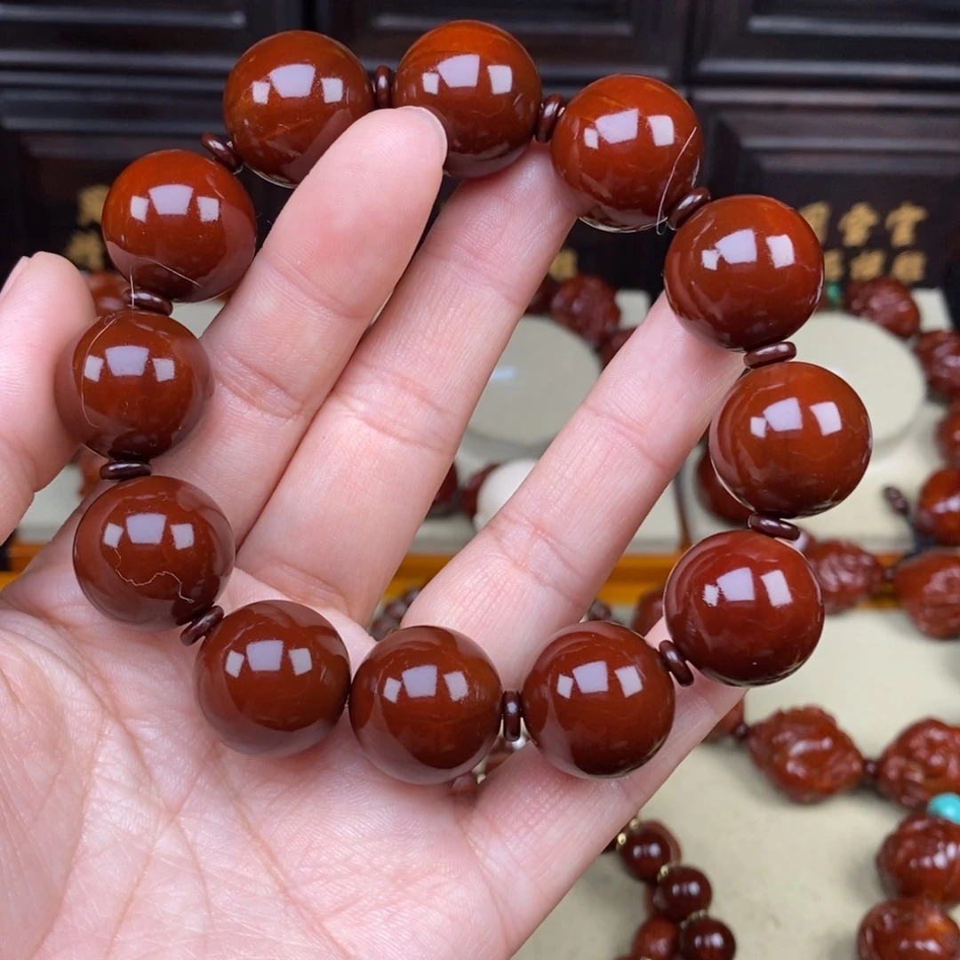 落***飘橄榄核吊坠正圆光珠