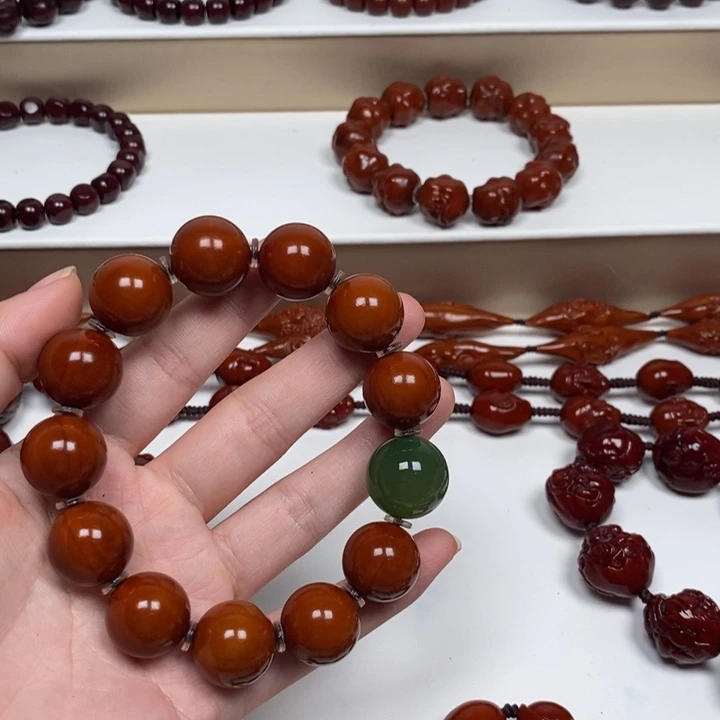 张***椒橄榄核雕刻工艺的发展