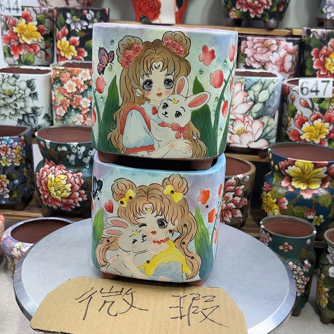 景德镇陶瓷花盆小**。景德镇陶瓷花盆