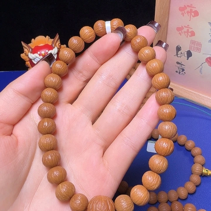 M***-吊坠猴头核桃凤羽