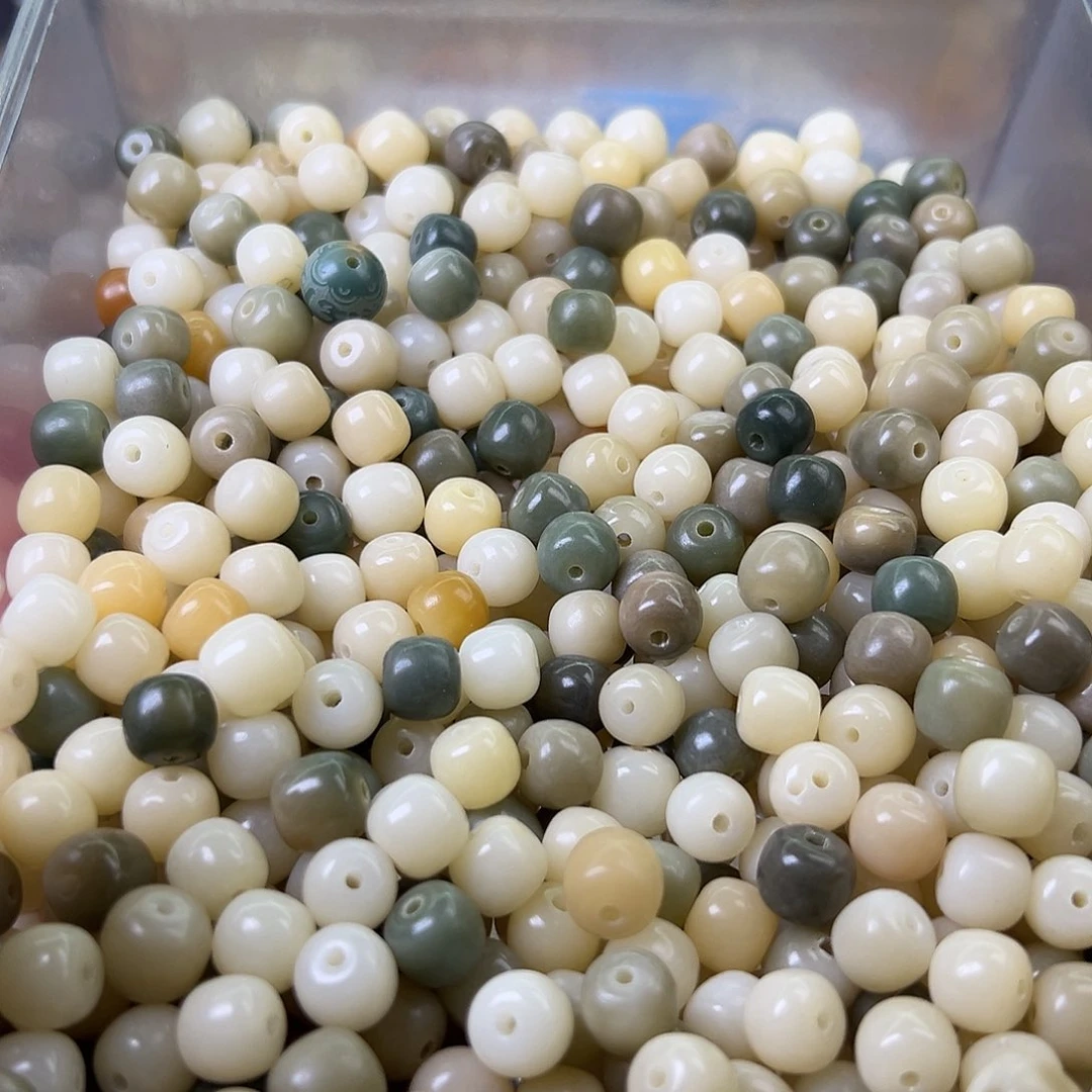 菩提根/象牙果手串微瑕卡10白颗桶200颗