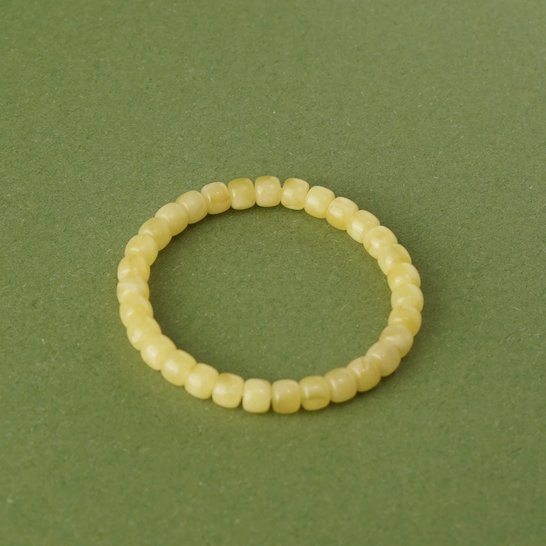 约7mm俄料精工归圆鸡油黄蜜蜡老型单圈手串