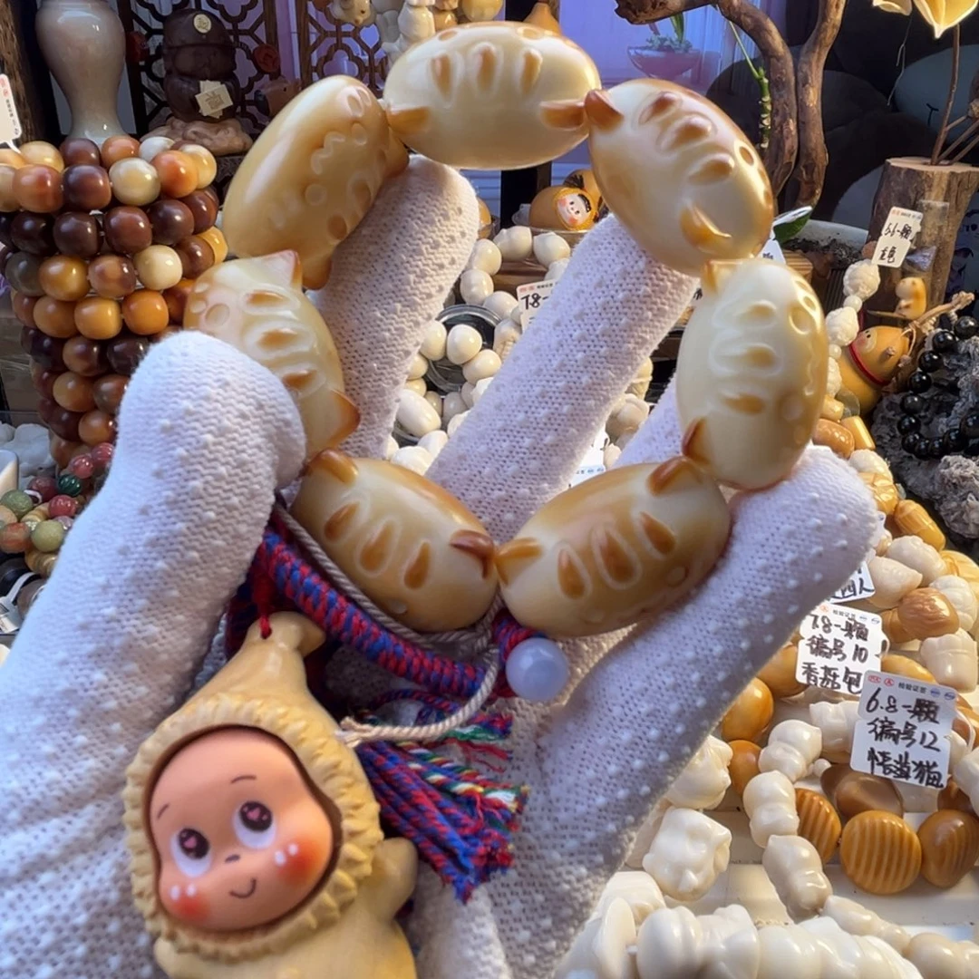手串菩提根/象牙果-烤色法棍配星星人提溜