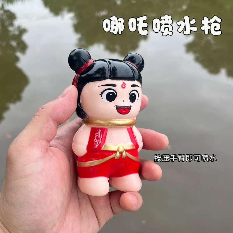 新款哪吒喷水枪儿童戏水创意按压喷水夏季户外玩具水枪打水仗男女