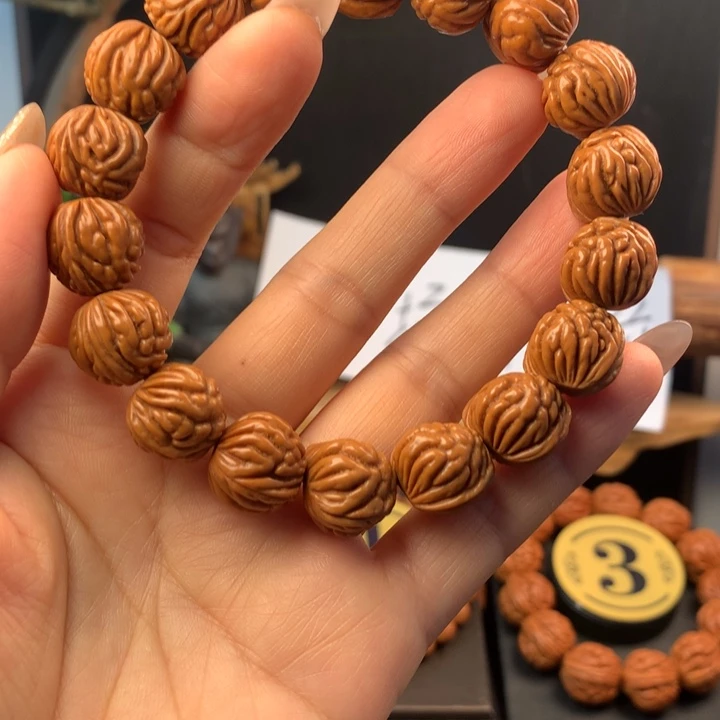 文玩核桃吊坠15金豆野生