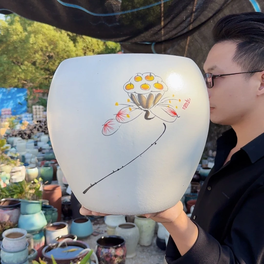 紫砂花盆口21高23（一个球莲花