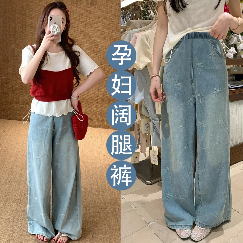 早秋新蝴蝶结提花重工刺绣直筒阔腿孕妇猪鼻扣调节牛仔裤