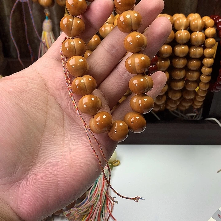 A***n吊坠桃核全品柯基屁桃