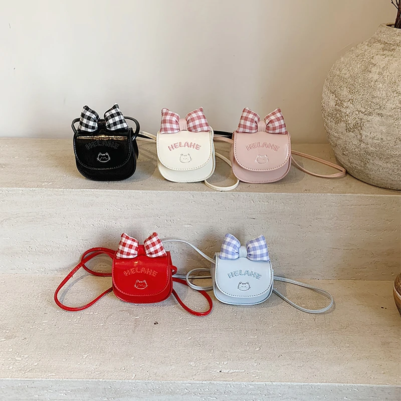 儿童包新款卡通可爱猫咪宝宝零钱包洋气格子蝴蝶结亲子耳机斜挎包
