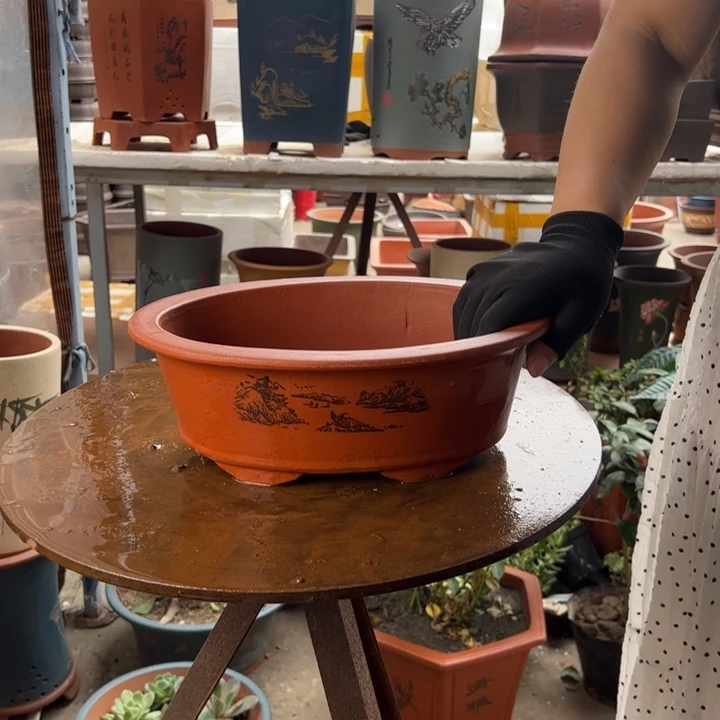 宜兴紫砂30红椭圆