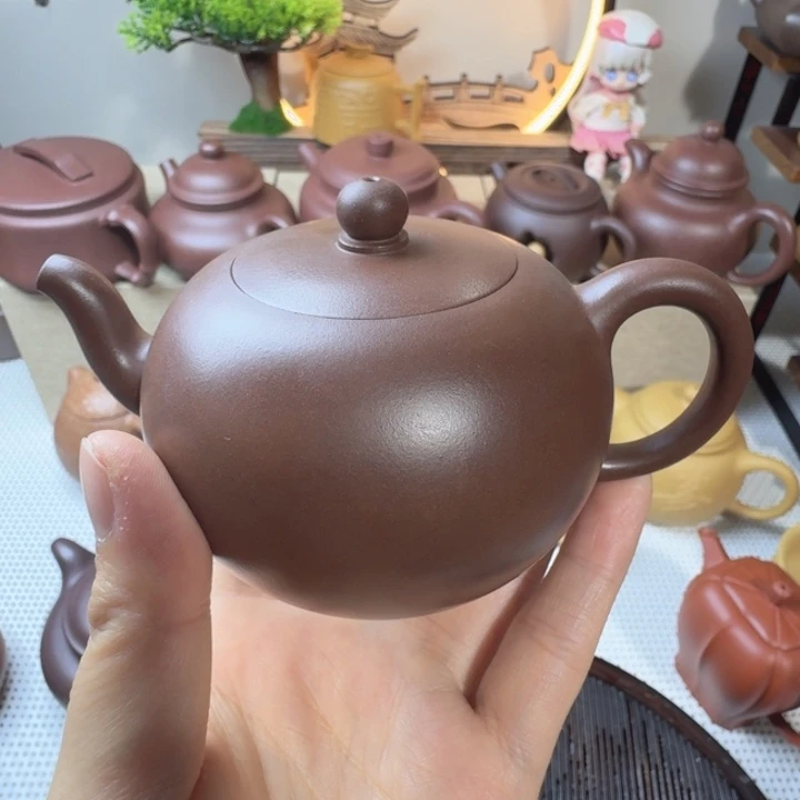 前***方微瑕一粒珠150cc紫泥