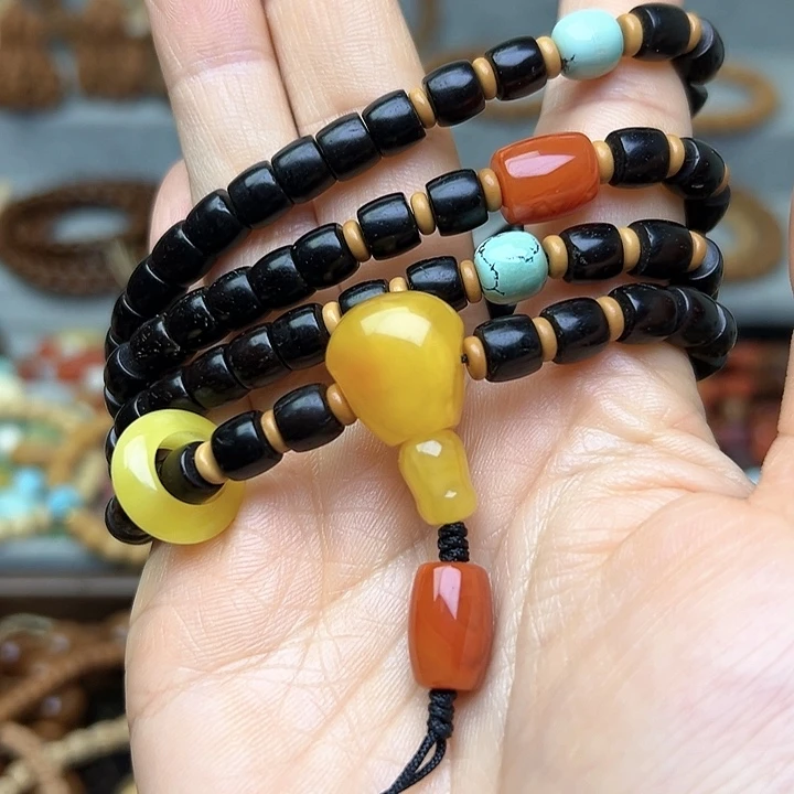 椰蒂吊坠脖挂长串