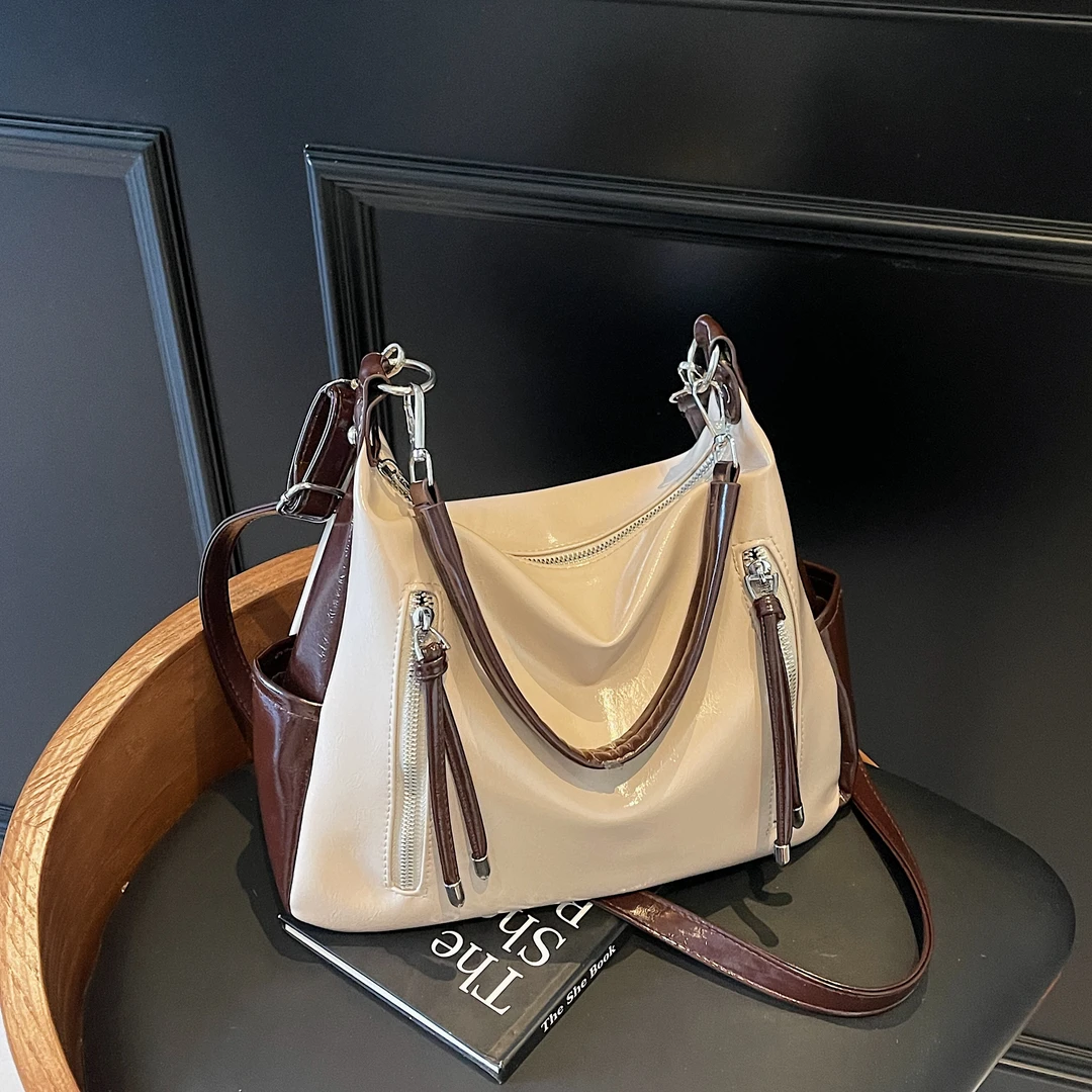 2025春夏新款时尚简约休闲托特复古大容量通勤上班女士单肩斜挎包