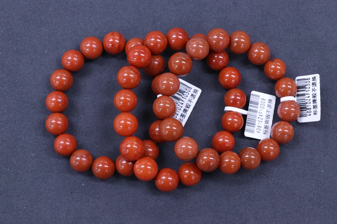 1原矿无优化天然南红川料柿子红火焰纹单圈12mm左右多样性发一串