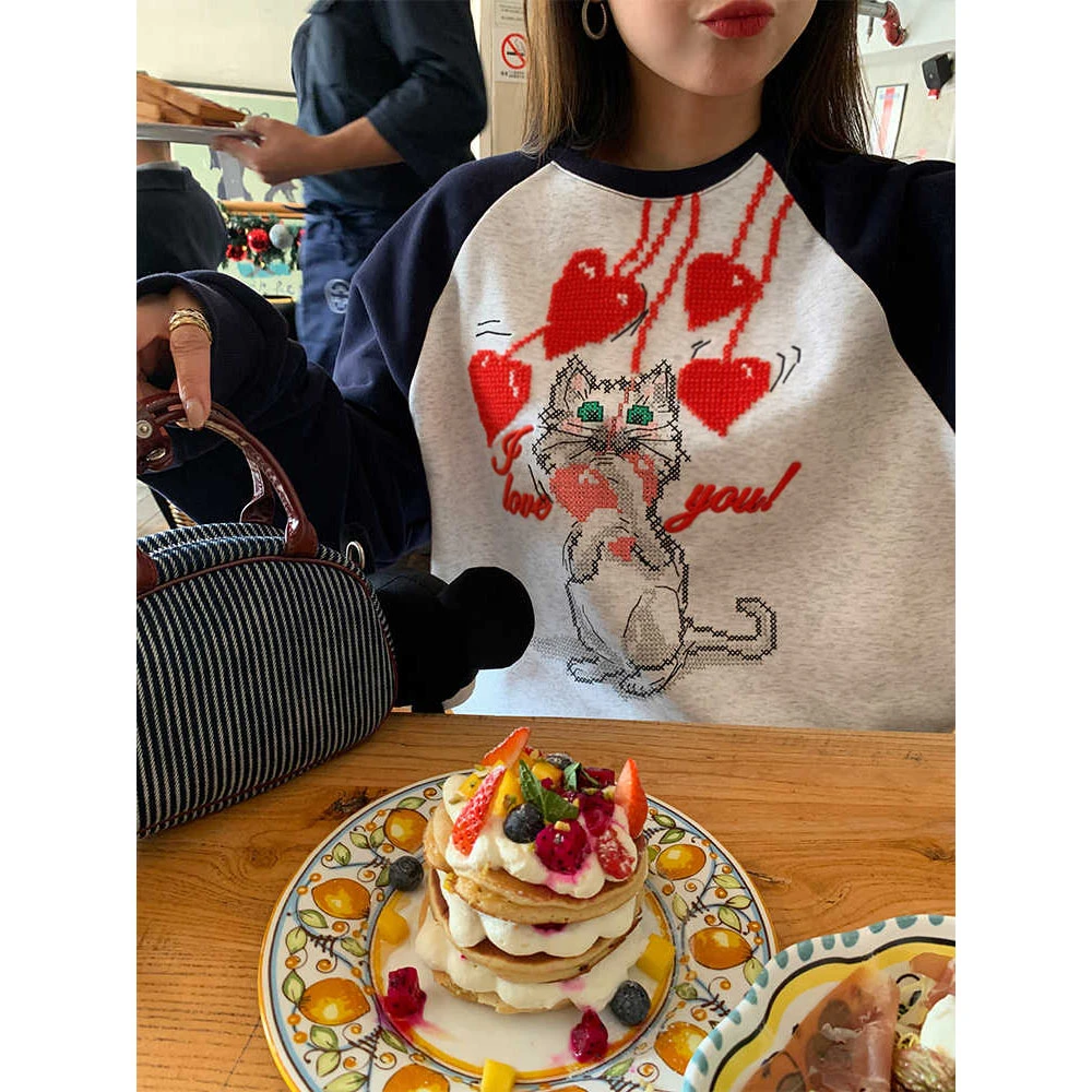 春秋新款潮牌插肩长袖卫衣女卡通猫咪印花百搭宽松休闲圆领上衣