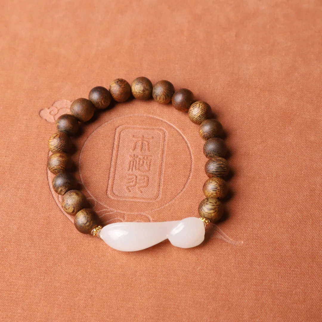 沉香【如意】沉香乌身圆叶单圈手串