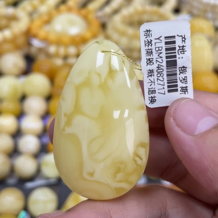 蜜蜡未镶嵌裸石48*29*12mm花粉 妖花水滴