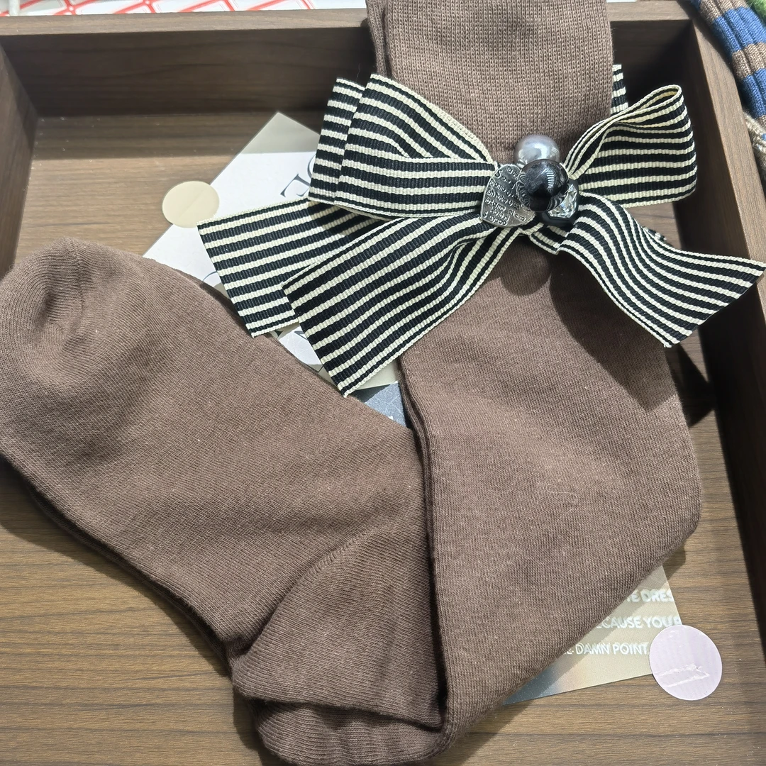 A807黑色条纹蝴蝶结长款袜子