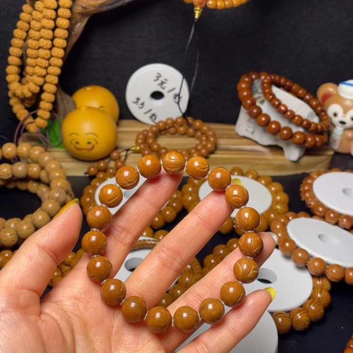 手串桃核11.7左右龙纹正圆光珠手串