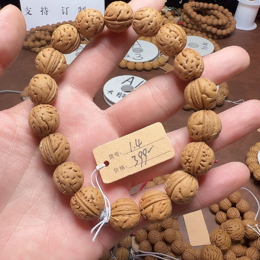喝***風手串桃核1.4食人花
