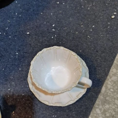 瓷片微瑕卷边咖啡杯一个