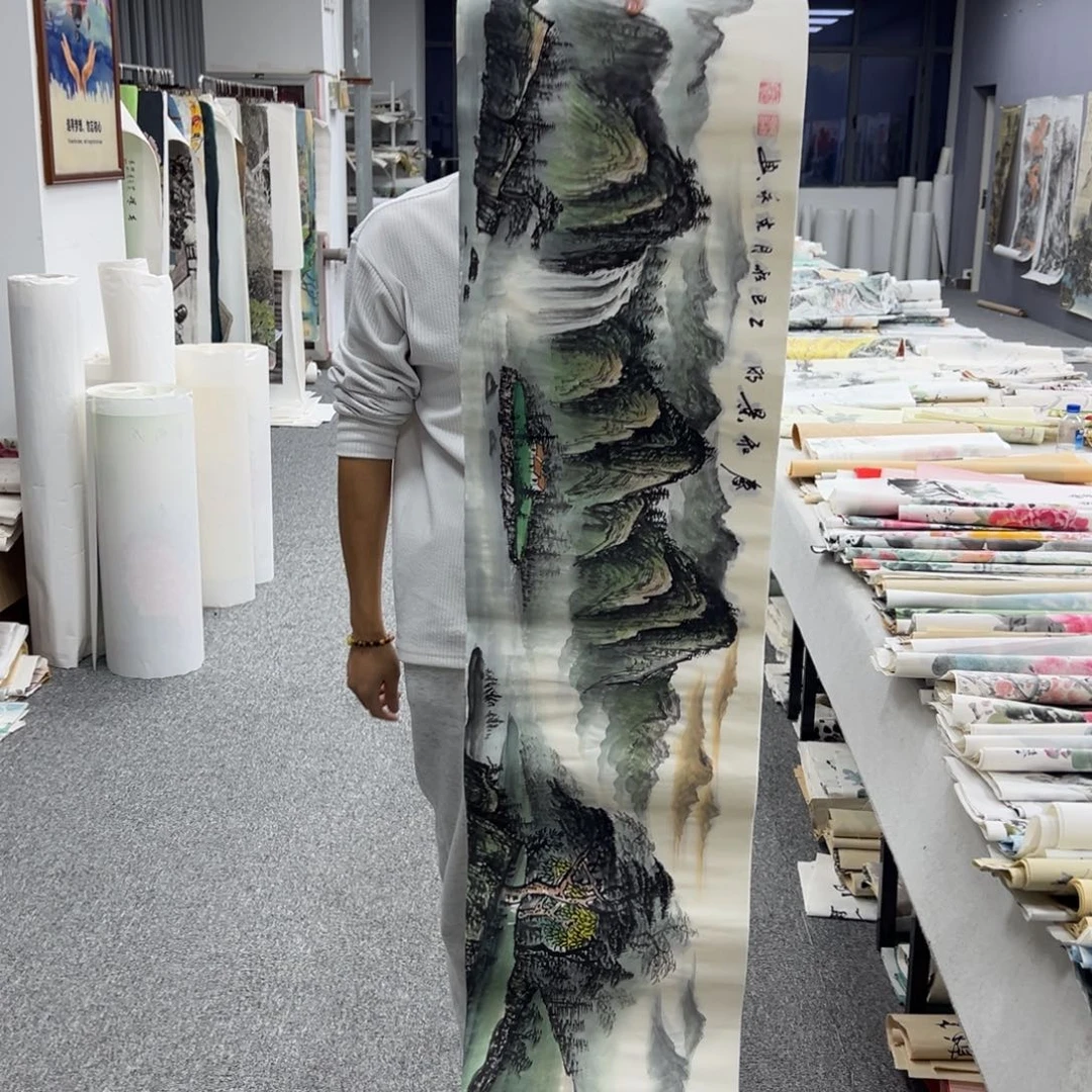 国画卖字画的小男孩