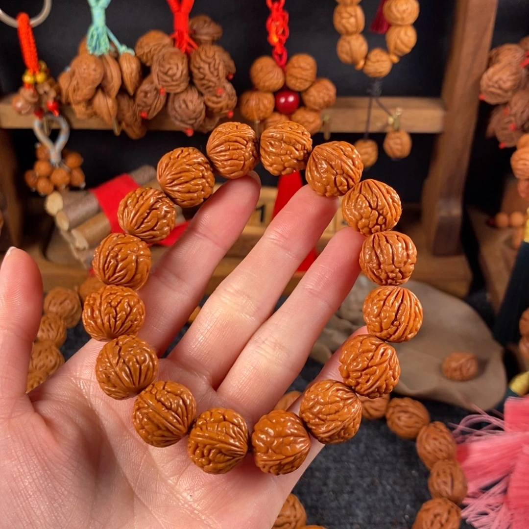 吊坠桃核桃枭手串