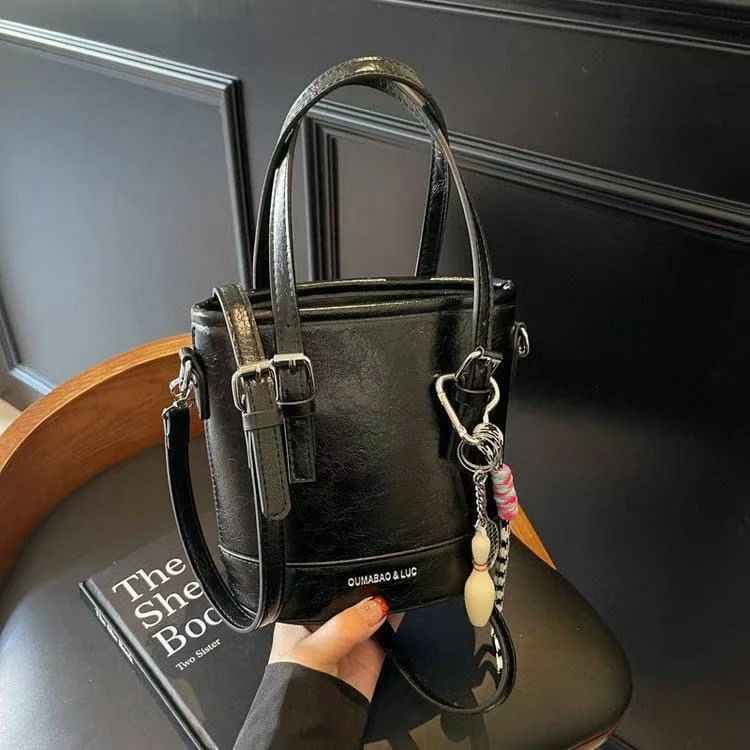 5908包包皮手提包水桶时尚百搭