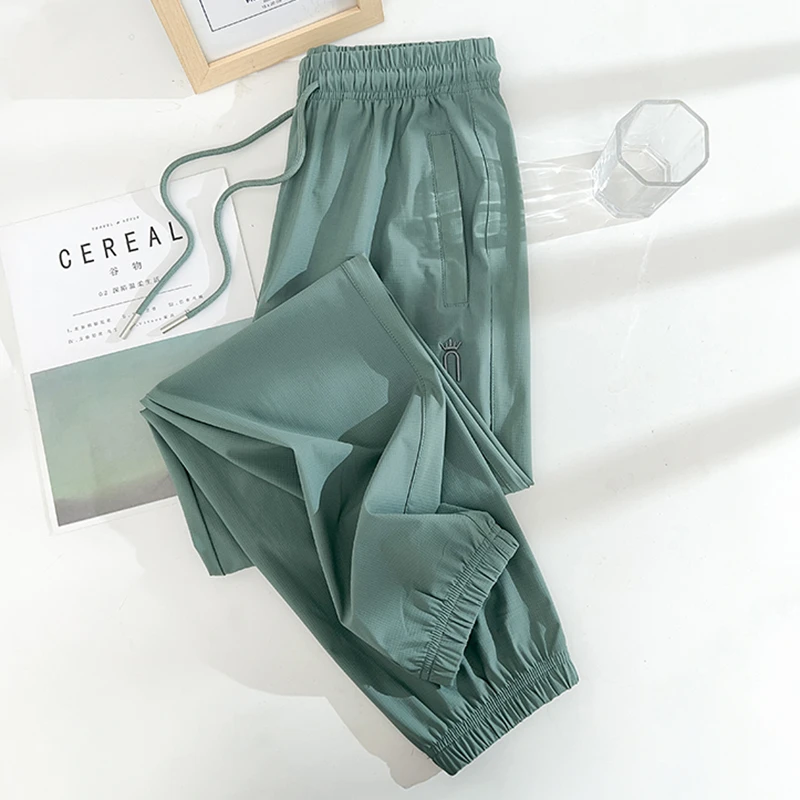 高级感绿色冰丝运动裤女夏季小个子女休闲裤大码宽松九分凉感卫裤