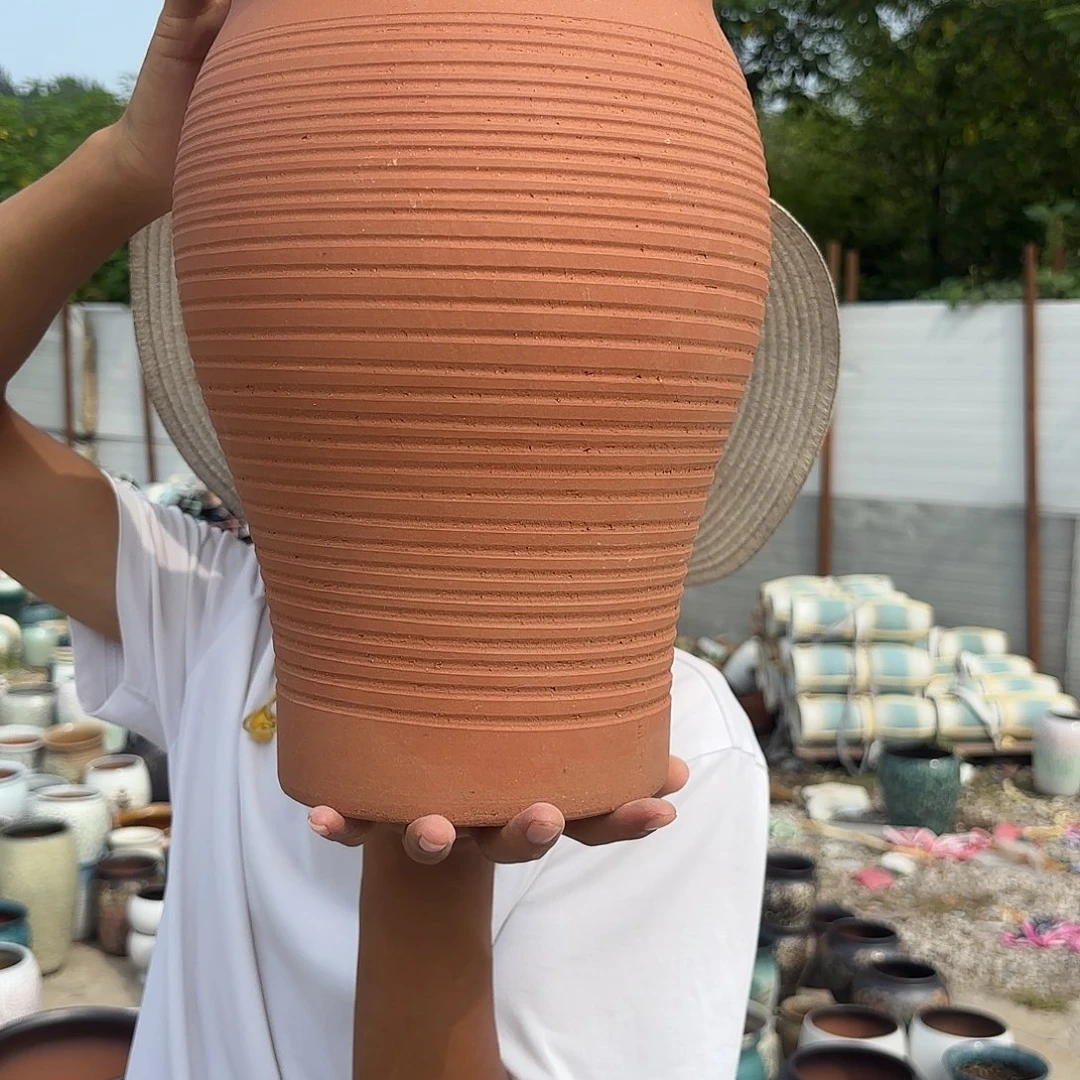 红陶鱼尾一个口径20高度31