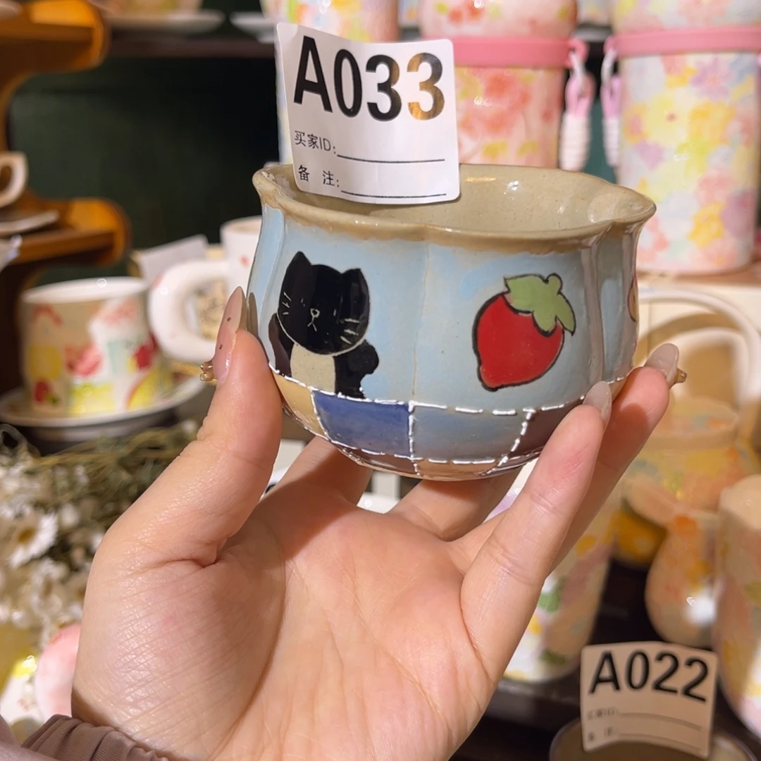 陶瓷手柄款花瓣口手握杯