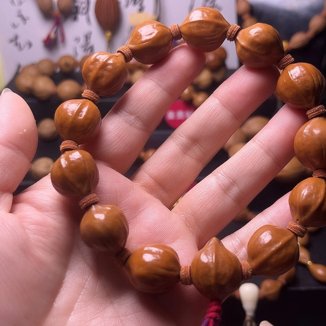 手串橄榄核梅林蜜桃臀