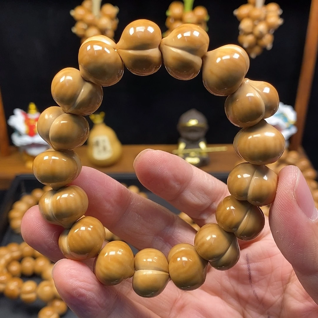 哈***儿猴头核桃吊坠屁桃子