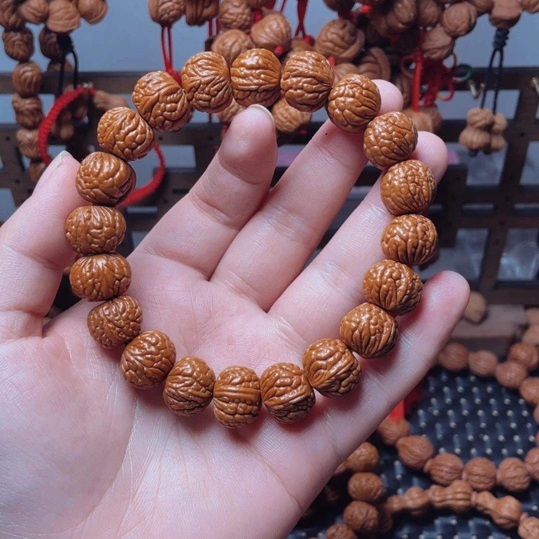 风***华木质类龙纹桃枭手串