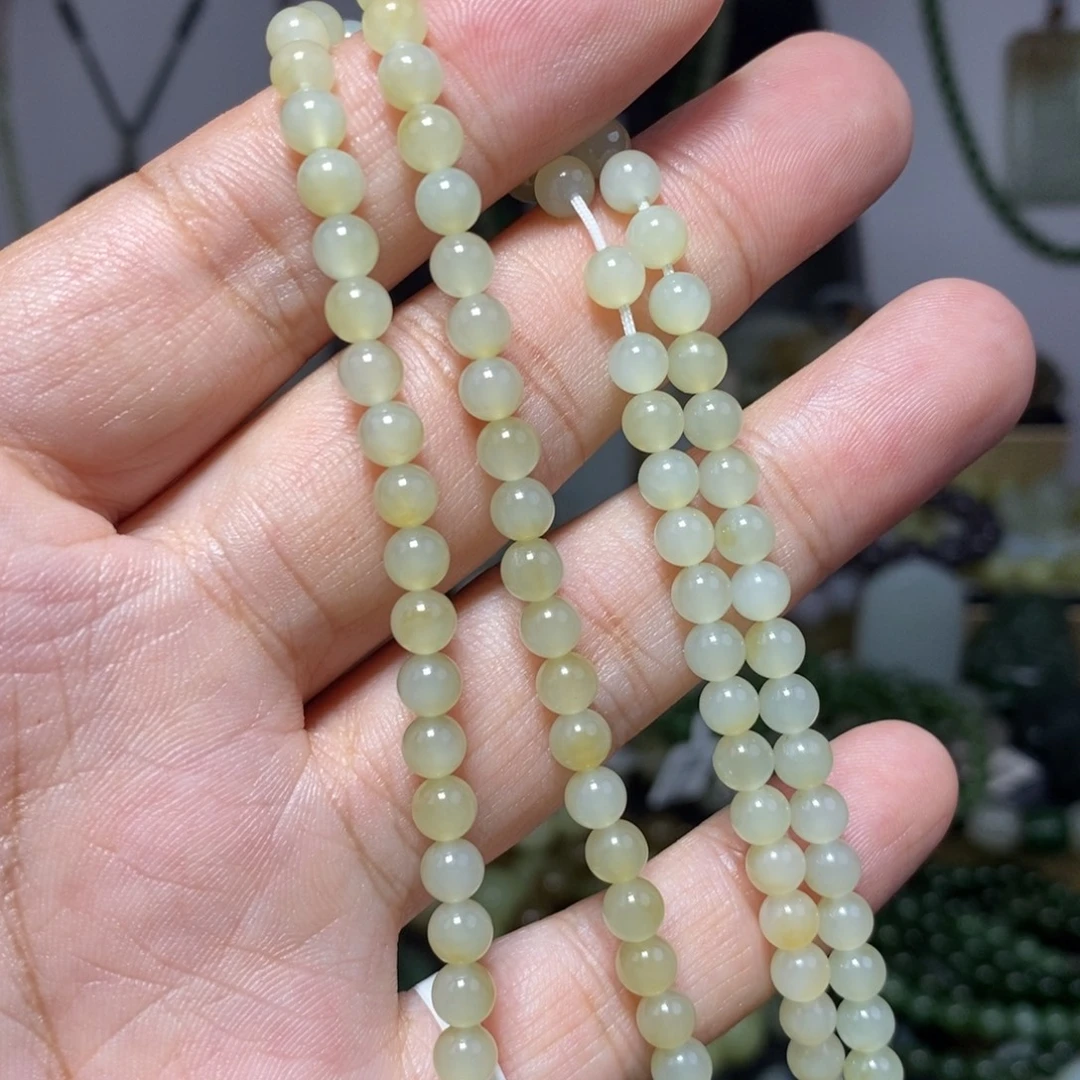 我***鱼和田玉未镶嵌手链