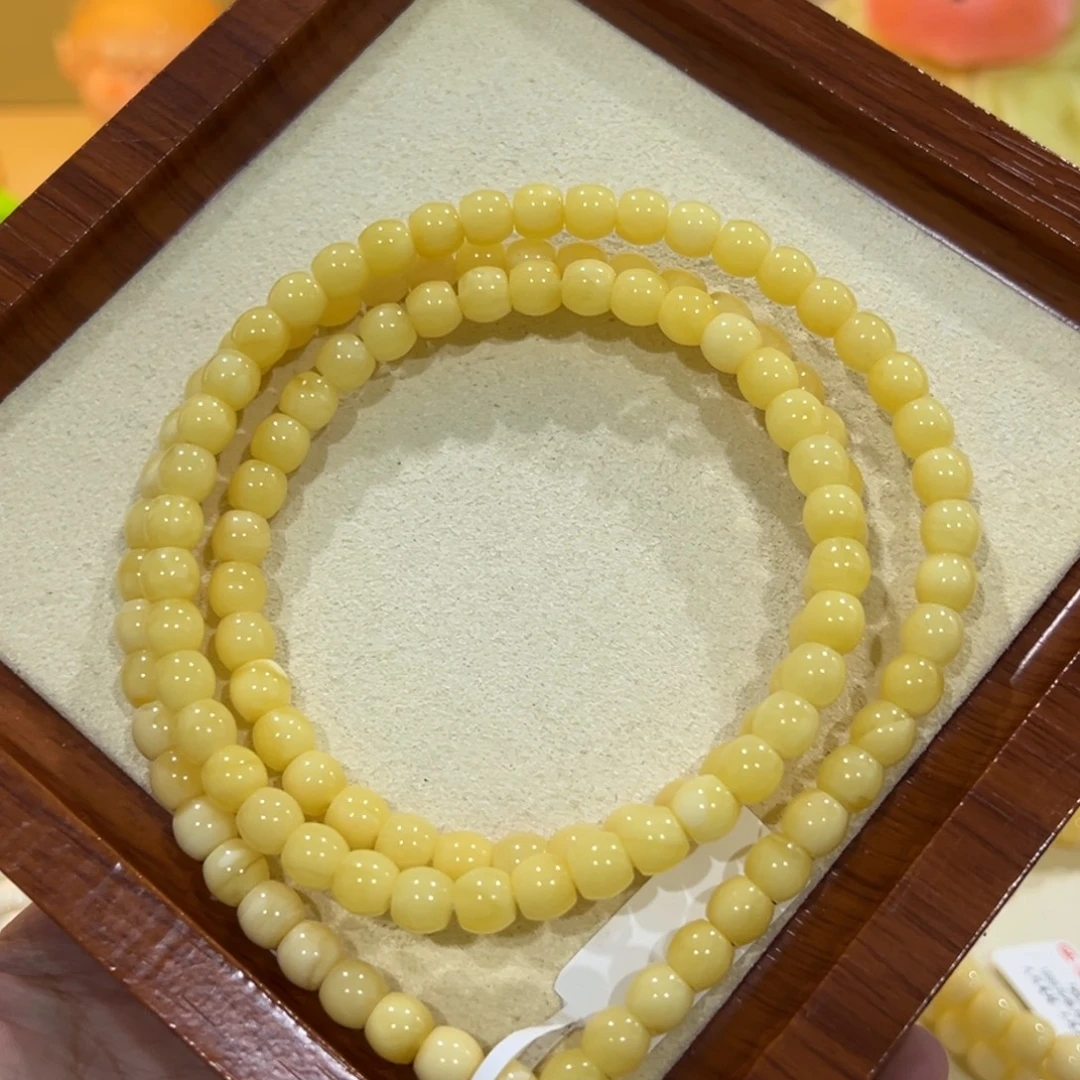 小****蜜蜡未镶嵌手链6.5m黄白花直切108